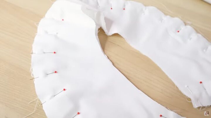 how to make a diy statement collar blouse with beautiful embroidery, Pinning the collar ready to sew