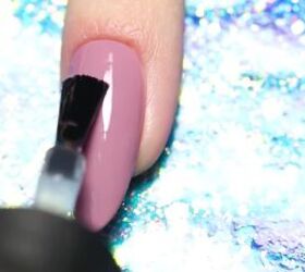 3 elegant marble nail ideas that are easy to create at home, Applying a clear top coat to the nail polish