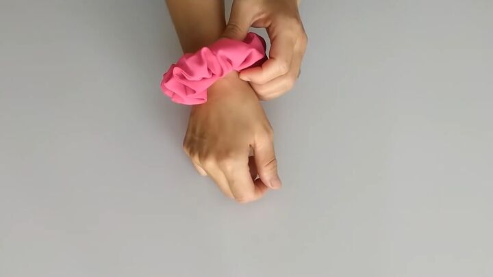 how to sew hair scrunchies quick easy scrap fabric project, Pink DIY scrunchie on a wrist