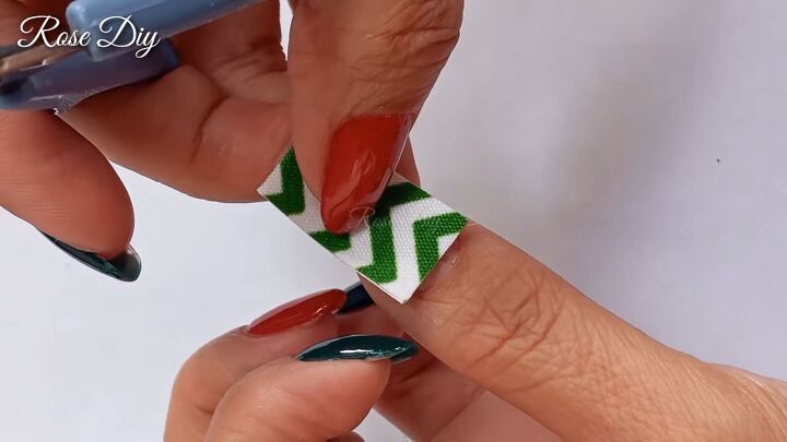 washi tape nails decorate nails with washi tape for a festive look, Measuring the size of the wash tape on a nail