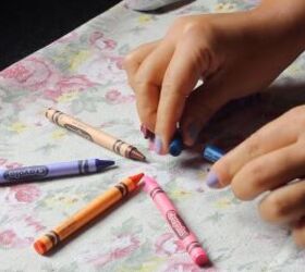 how to make lipstick with crayons fun colorful diy tutorial, Removing the paper from the crayons