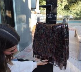 need a unique holiday outfit make this festive diy tinsel skirt, Trimming stray bits of tinsel trim