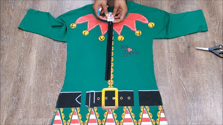 how to make an easy diy elf costume using a novelty christmas t shirt, Placing the zipper on the DIY elf costume