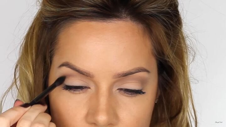 looking to wow this festive season try a sexy glitter eyeliner look, Medium brown eyeshadow in the crease