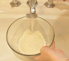 yao women rice water recipe how to make use it the authentic way, Rinsing the rice under a tap