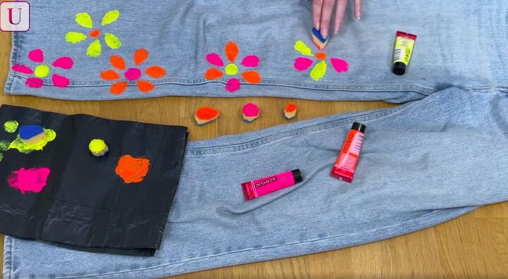 how to customize your jeans 3 different ways for a totally unique look, Painting a DIY jeans design