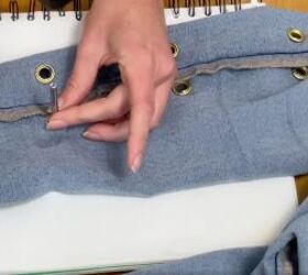 how to customize your jeans 3 different ways for a totally unique look, Hammering grommets into the jeans