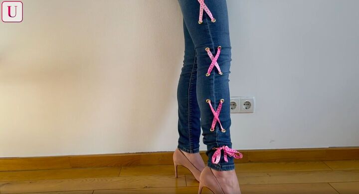 how to customize your jeans 3 different ways for a totally unique look, Adding lace up ribbon detail to jeans