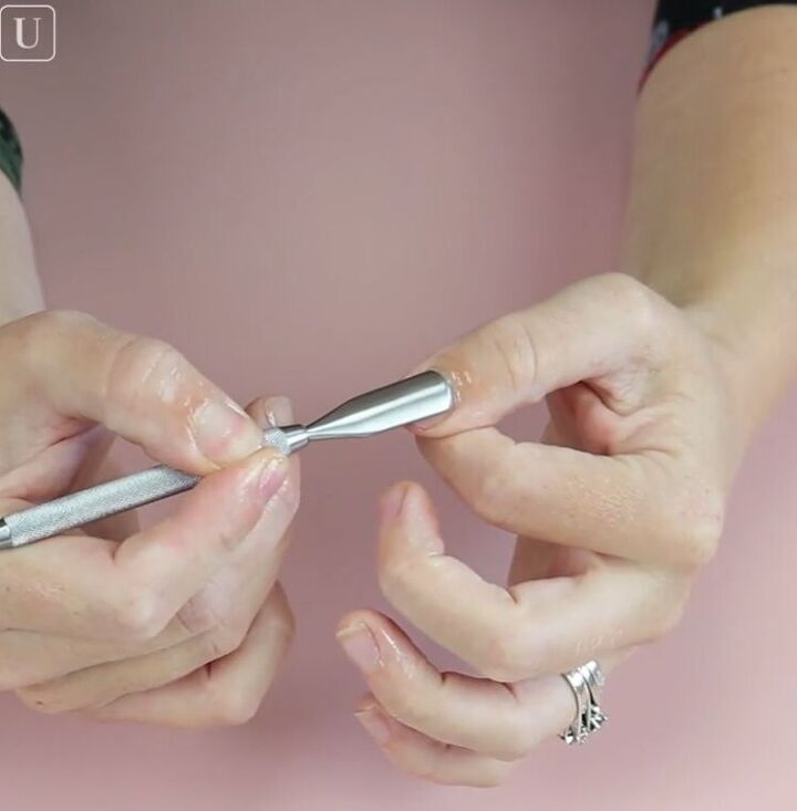 try these easy home manicure hacks to keep nails healthy shiny, Pushing cuticles back with a cuticle pusher