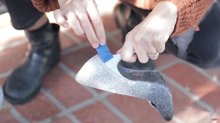 how to make glamorous diy ombre glitter heels inspired by jimmy choos, Peeling the painters tape off the heel