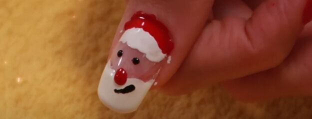5 super cute christmas acrylic nail ideas to rock this holiday season, Santa acrylic nails in Christmas colors