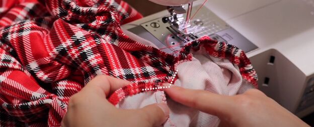 how to make a festive diy plaid christmas dress for the holidays, Inserting elastic into the casing