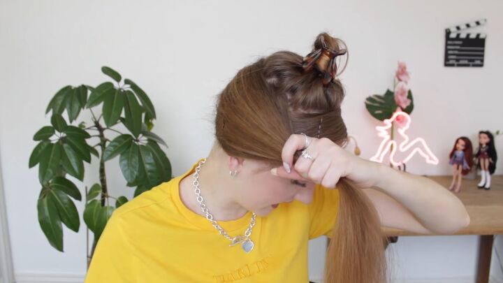 how to get straight hair without heat the silk scarf wrapping method, Using bobby pins to secure hair in place