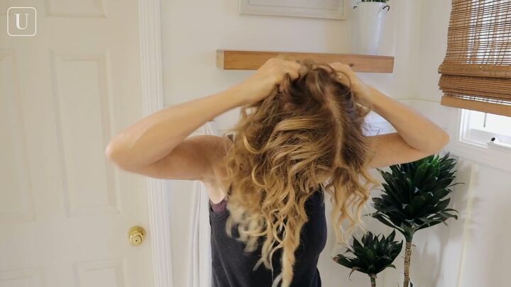 7 step wavy hair routine that will enhance your natural curls, Applying hair oil to hair