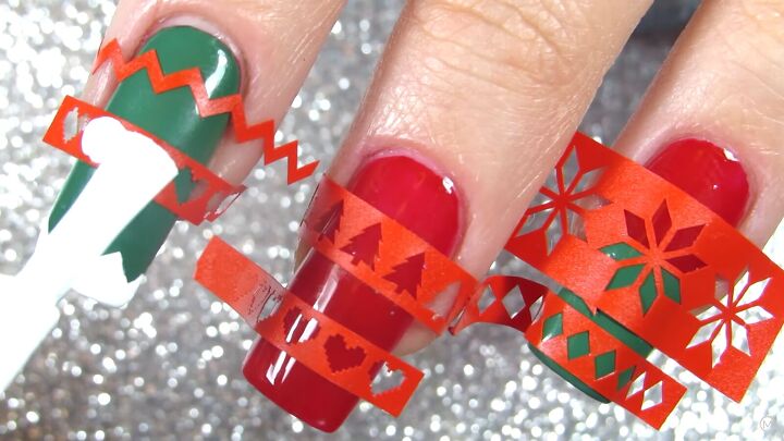 these festive green red christmas sweater nails are so easy to do, Applying white nail polish on the vinyls