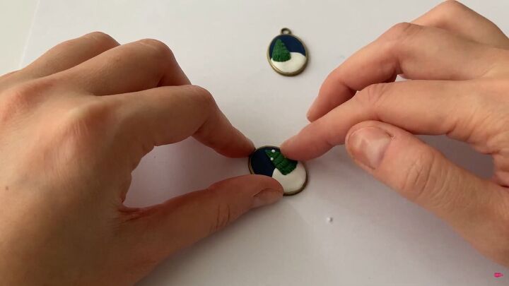 how to make charming diy christmas earrings out of polymer clay, Applying white snow to the tree design