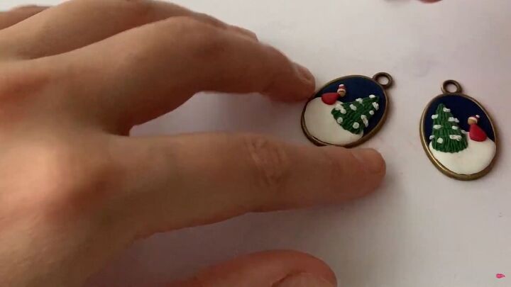 how to make charming diy christmas earrings out of polymer clay, Adding a white pompom to the hat