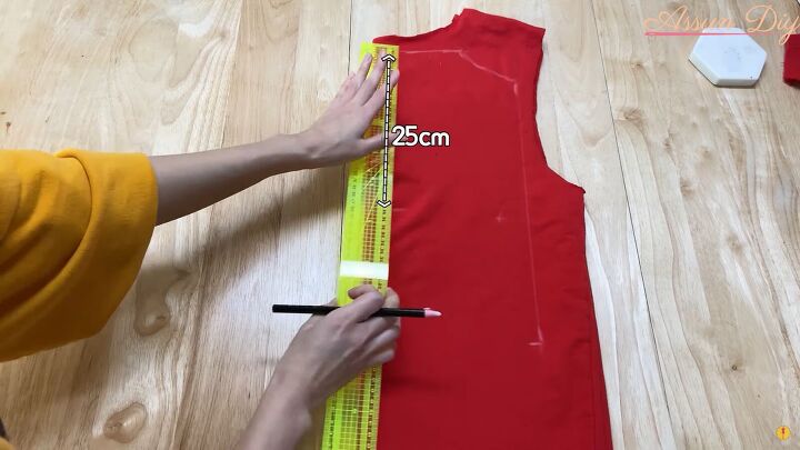 how to make a cute diy christmas dress out of an old red hoodie, Marking the top of the Christmas dress