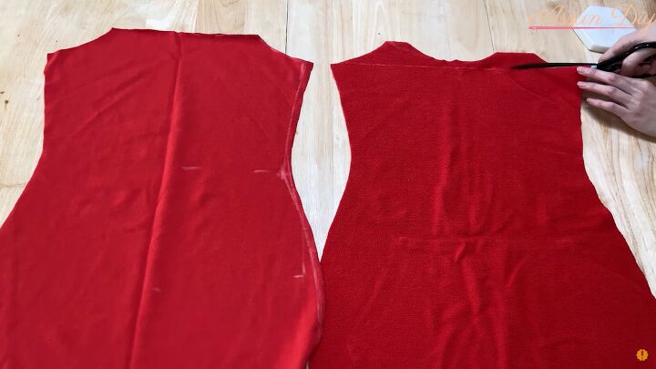 how to make a cute diy christmas dress out of an old red hoodie, Cutting across the top of the fabric