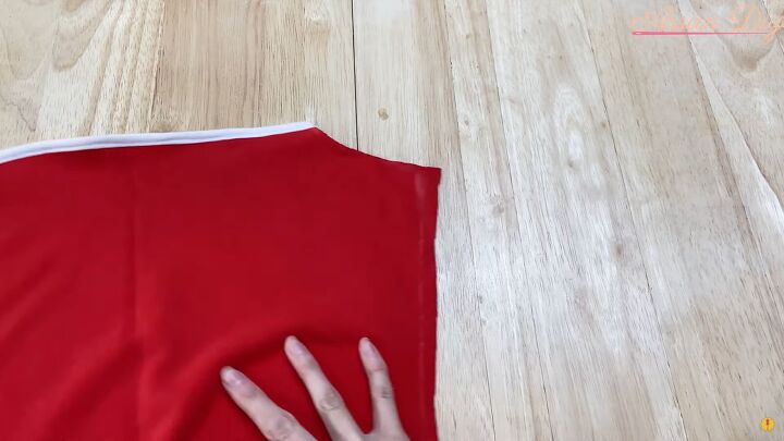 how to make a cute diy christmas dress out of an old red hoodie, Trimming excess elastic