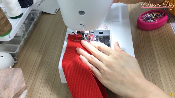 how to make a cute diy christmas dress out of an old red hoodie, Sewing the ribbing pieces together