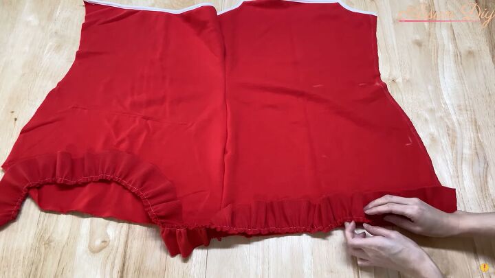how to make a cute diy christmas dress out of an old red hoodie, Pinning the ruffle to the DIY Christmas dress