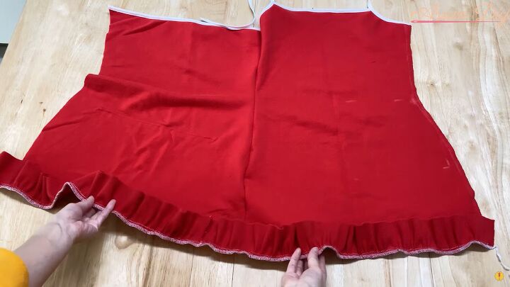 how to make a cute diy christmas dress out of an old red hoodie, Sewing the ruffle to the DIY Christmas dress