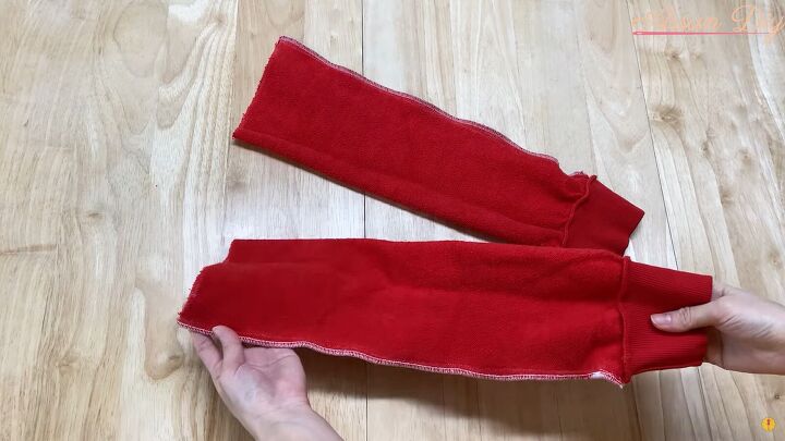 how to make a cute diy christmas dress out of an old red hoodie, Sewing a new inner seam for the sleeves