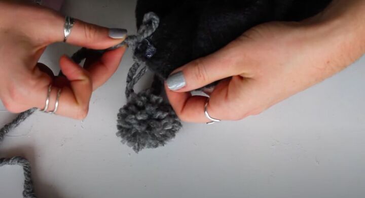 how to make an easy no sew diy sweater christmas stocking, Making a handmade DIY Christmas stocking