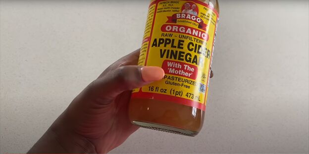 how to get dead skin off feet make them feel soft again in 24 hours, Bottle of apple cider vinegar with mother
