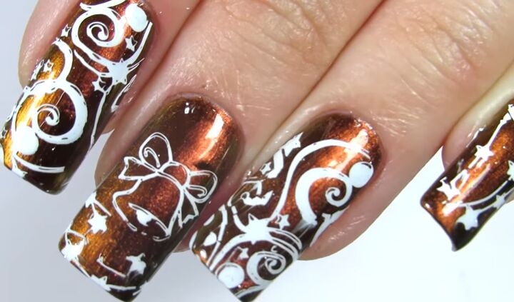 how to do easy christmas stamping nail art that looks professional, Christmas stamping nail art