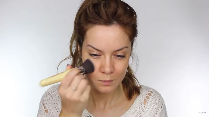 need some new year sparkle try this glitter glam makeup look, Applying foundation with a brush