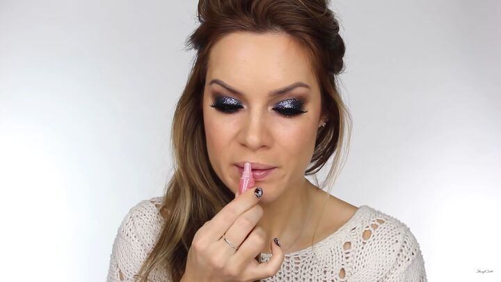 need some new year sparkle try this glitter glam makeup look, Applying a nude lip gloss to balance out eyes