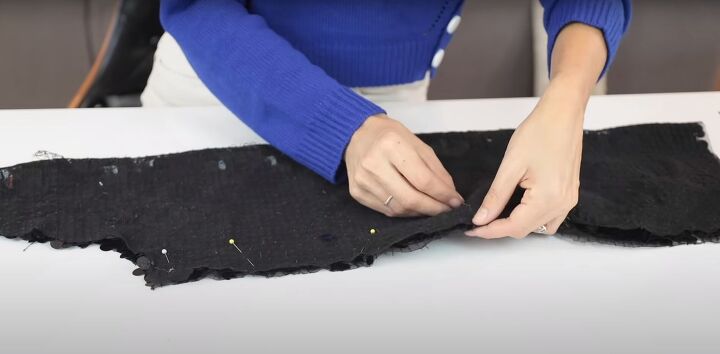 how to make a cute sparkly diy sequin jacket for the holidays, Pinning the sleeve seams