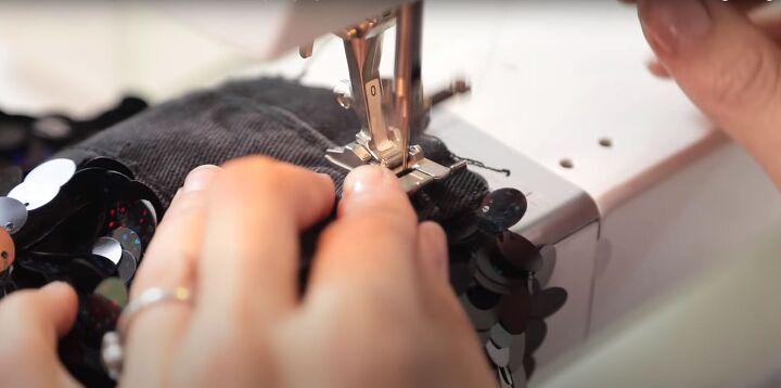 how to make a cute sparkly diy sequin jacket for the holidays, Sewing the cuff to the sleeve
