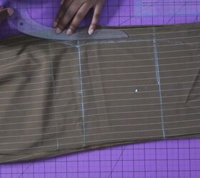 how to sew wide leg pants to straight leg in 6 quick easy steps, Using a curved ruler to connect the marks