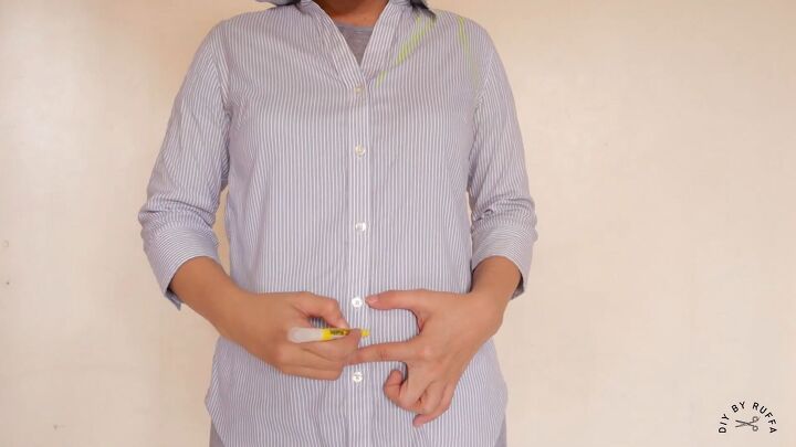 diy shirt into crop top how to refashion your old work shirts, Marking the new length of the top