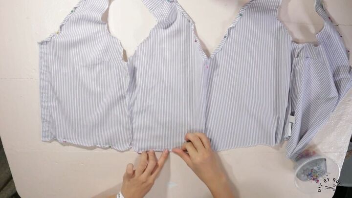 diy shirt into crop top how to refashion your old work shirts, Serging the raw edges of the shirt