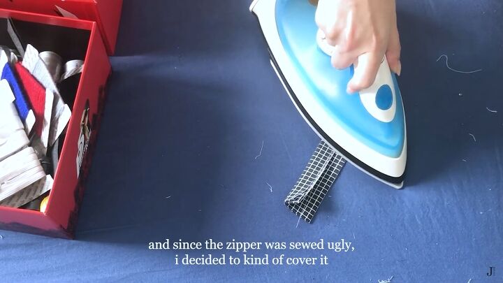 how to make a pleated skirt from an old duvet cover, Pressing fabric to cover the zipper
