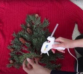how to make your own light up christmas sweater for the festive season, Attaching the design with a hot glue gun