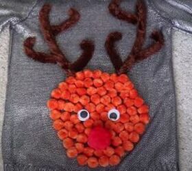 how to make your own light up christmas sweater for the festive season, Hot gluing googly eyes and a red nose