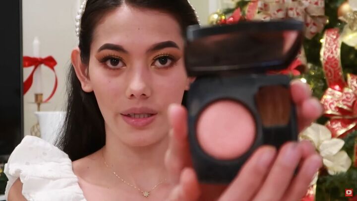 need some festive makeup inspo try this easy holiday makeup look, Applying blush