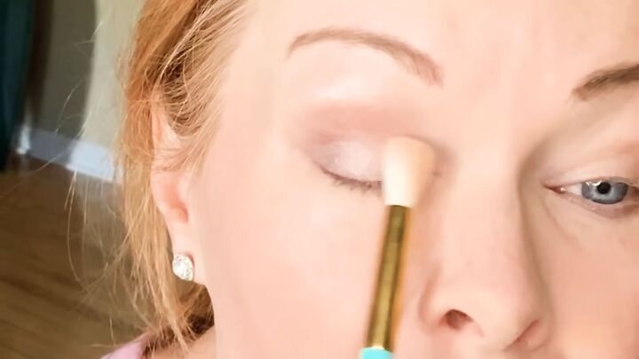 new to makeup try this easy neutral eyeshadow tutorial for beginners, Applying gold eyeshadow to the inner corner