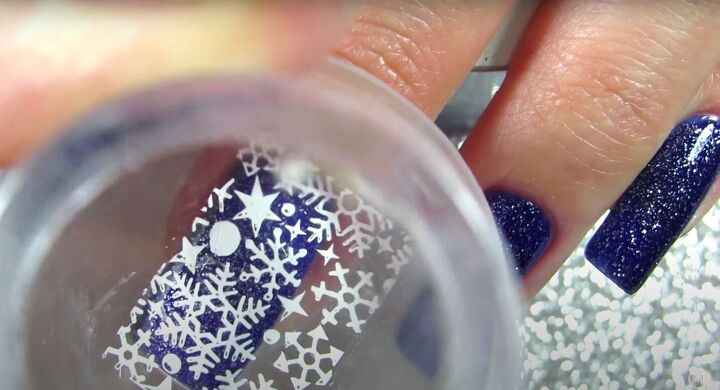 how to do fun blue snowflake nails for winter using stamping plates, How to do snowflake winter nails