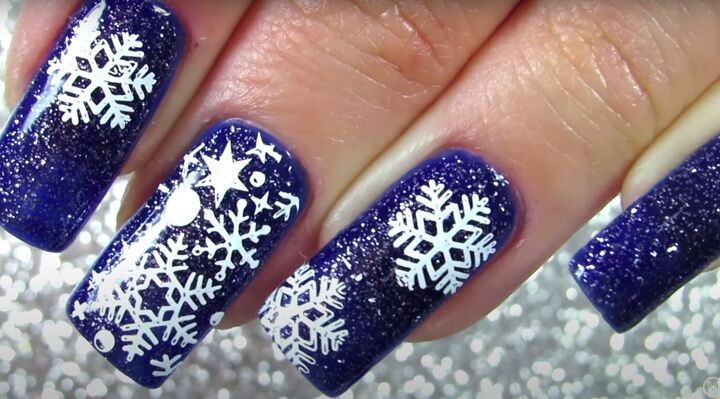 how to do fun blue snowflake nails for winter using stamping plates, Blue nails with snowflakes
