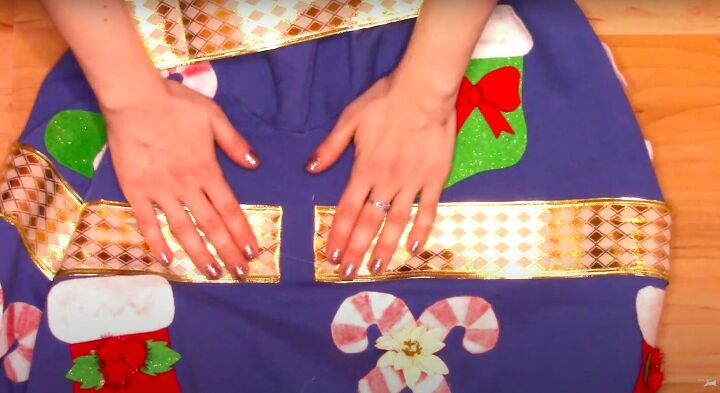 how to make a last minute diy ugly christmas sweater for the holidays, Leaving a gap in the ribbon for stretch