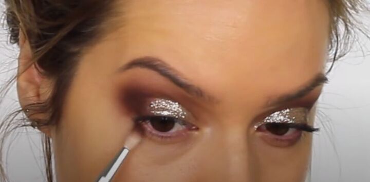 this dark sultry festive makeup look is perfect for a holiday party, Glittery festive eye makeup