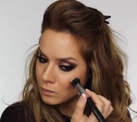 quick easy glam makeup for a new year s eve party, Brushing highlighter onto the cheekbones