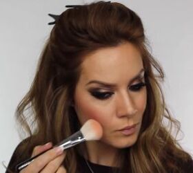 quick easy glam makeup for a new year s eve party, Applying a pink peach shade of blush