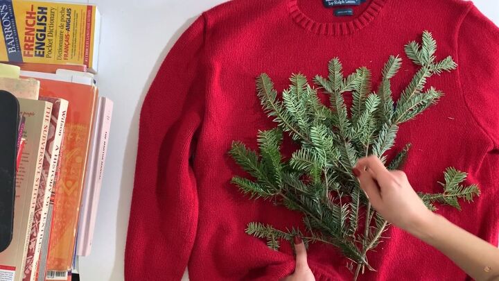 how to make a last minute diy christmas tree sweater for the holidays, Placing pine branches onto the sweater